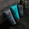 super facialist for men bundle with face wash, face scrub and moisturiser on volcanic black sand