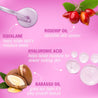 Product ingredients infographic. Squalane helps retain skin's moisture, rosehip oil for sensitive skin, hyaluronic acid to help boost skin moisture and babassu oil to give the balm it's silky smooth texture.